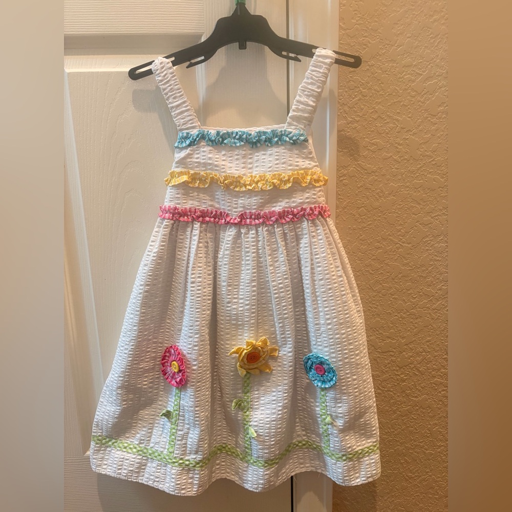 White Seersucker Girls' Floral Appliqué Sundress with Pastel Ruffle Trim